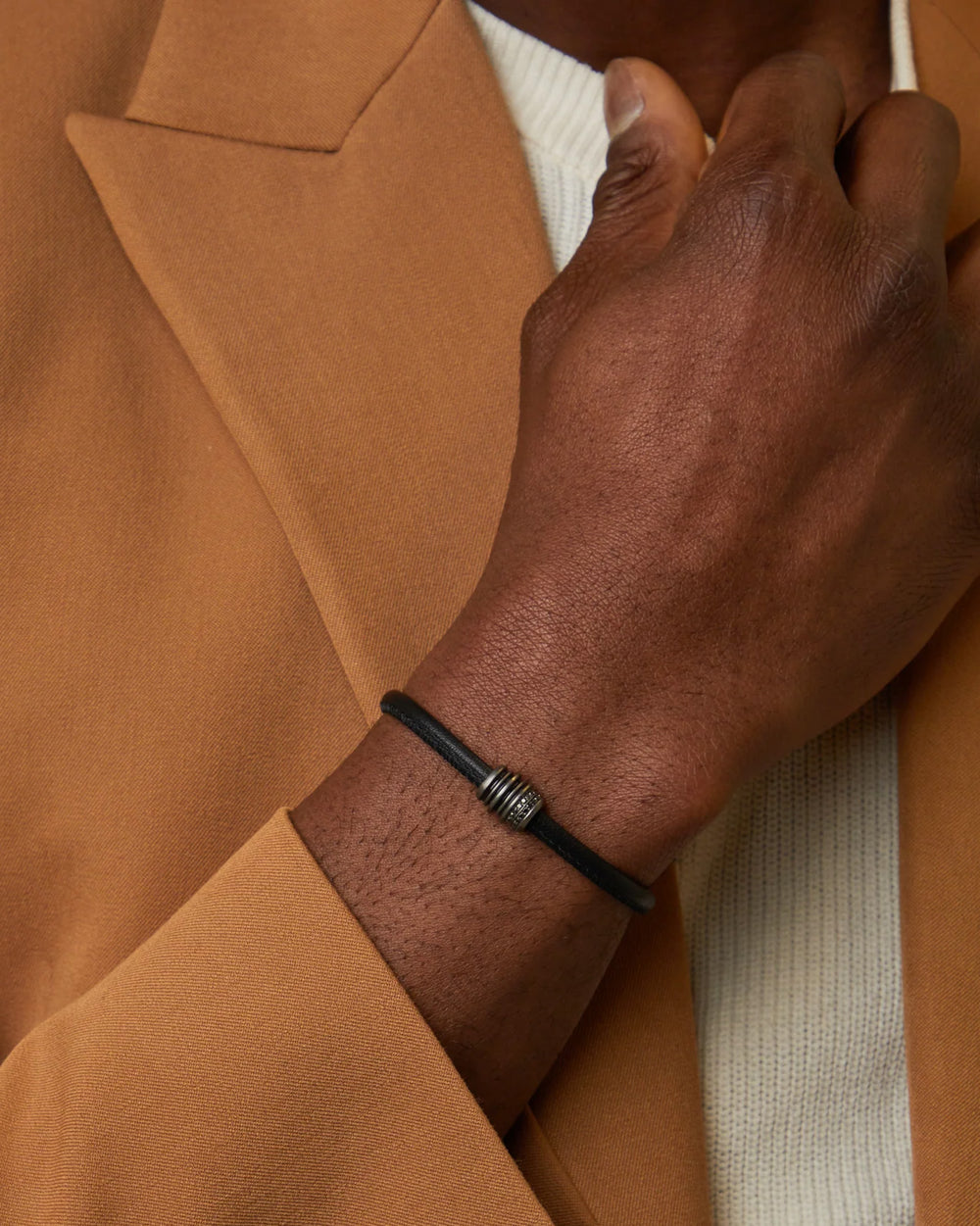 The Triple Black Barrel Leather Bracelet by Marco Dal Maso is a men’s leather bracelet crafted in oxidized sterling silver with black enamel and black diamond details. It measures 8 inches in length and is made in Italy. Explore more luxury gifts for men, including leather bracelets, pendants, watches, and accessories. All items are available online or in-store at Green Lake Gallery, located in Seattle and Bellevue.