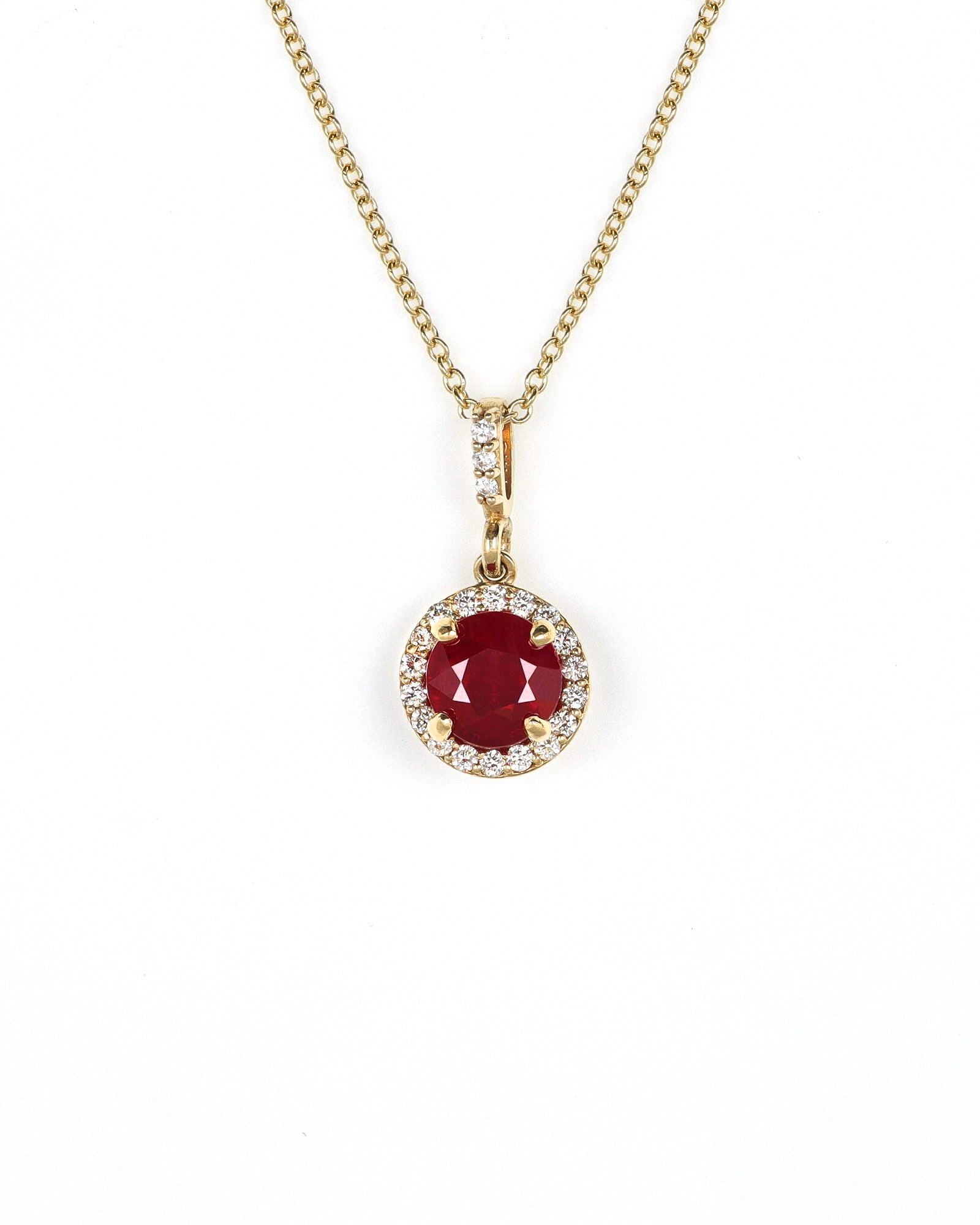 Ruby and diamond halo pendant