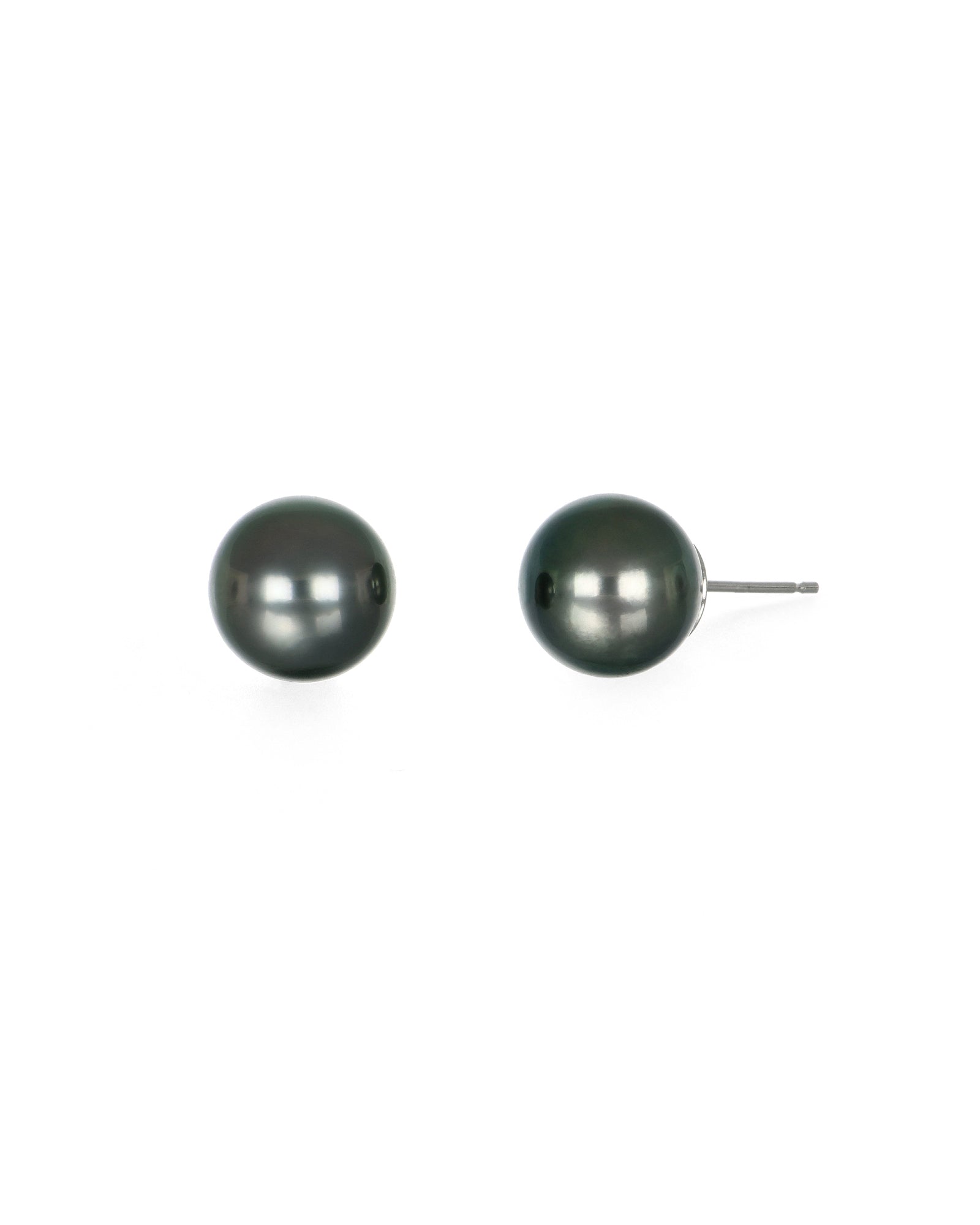 grey pearls studs on white background