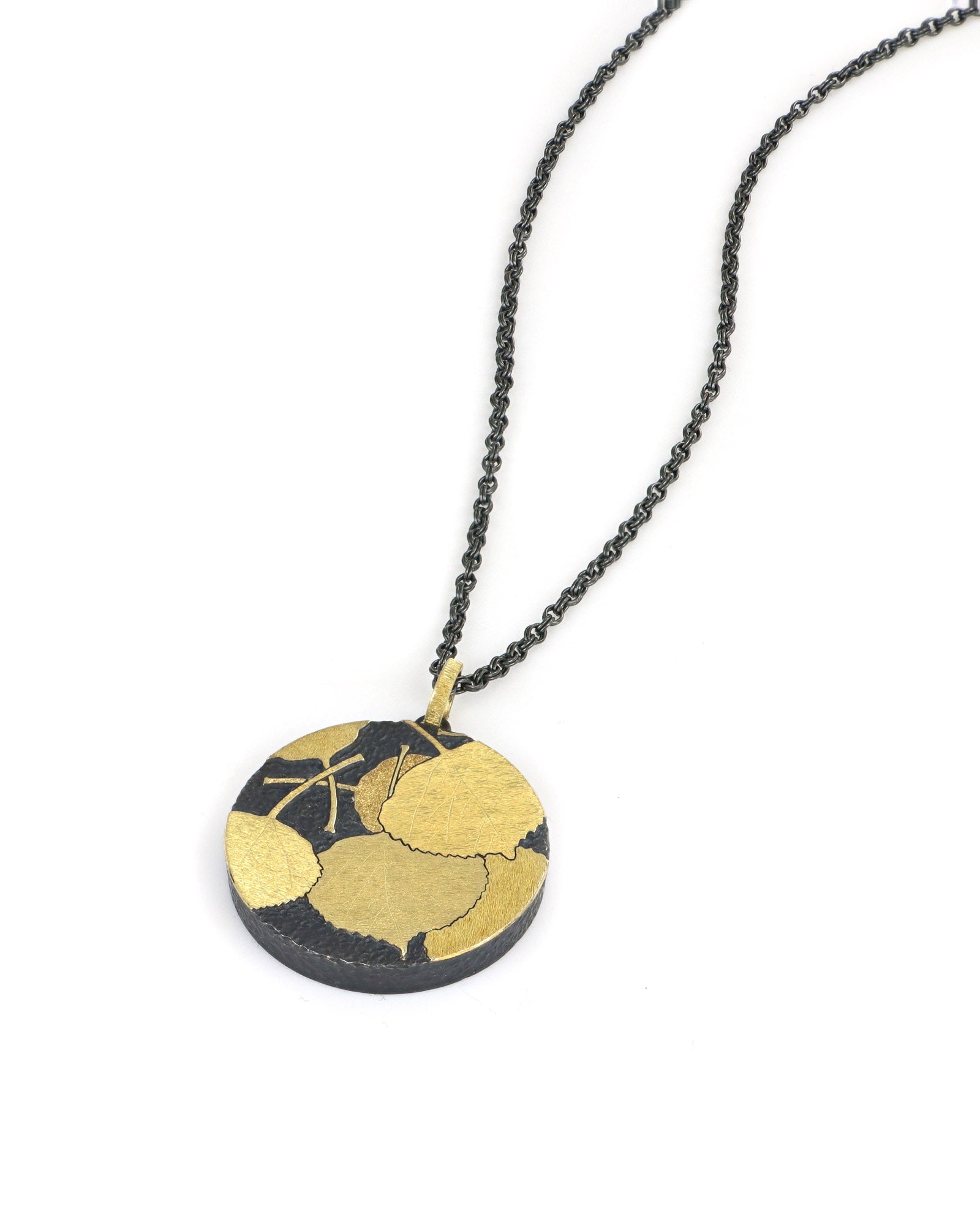 Aspen Leaves Connecting to Earth Pendant