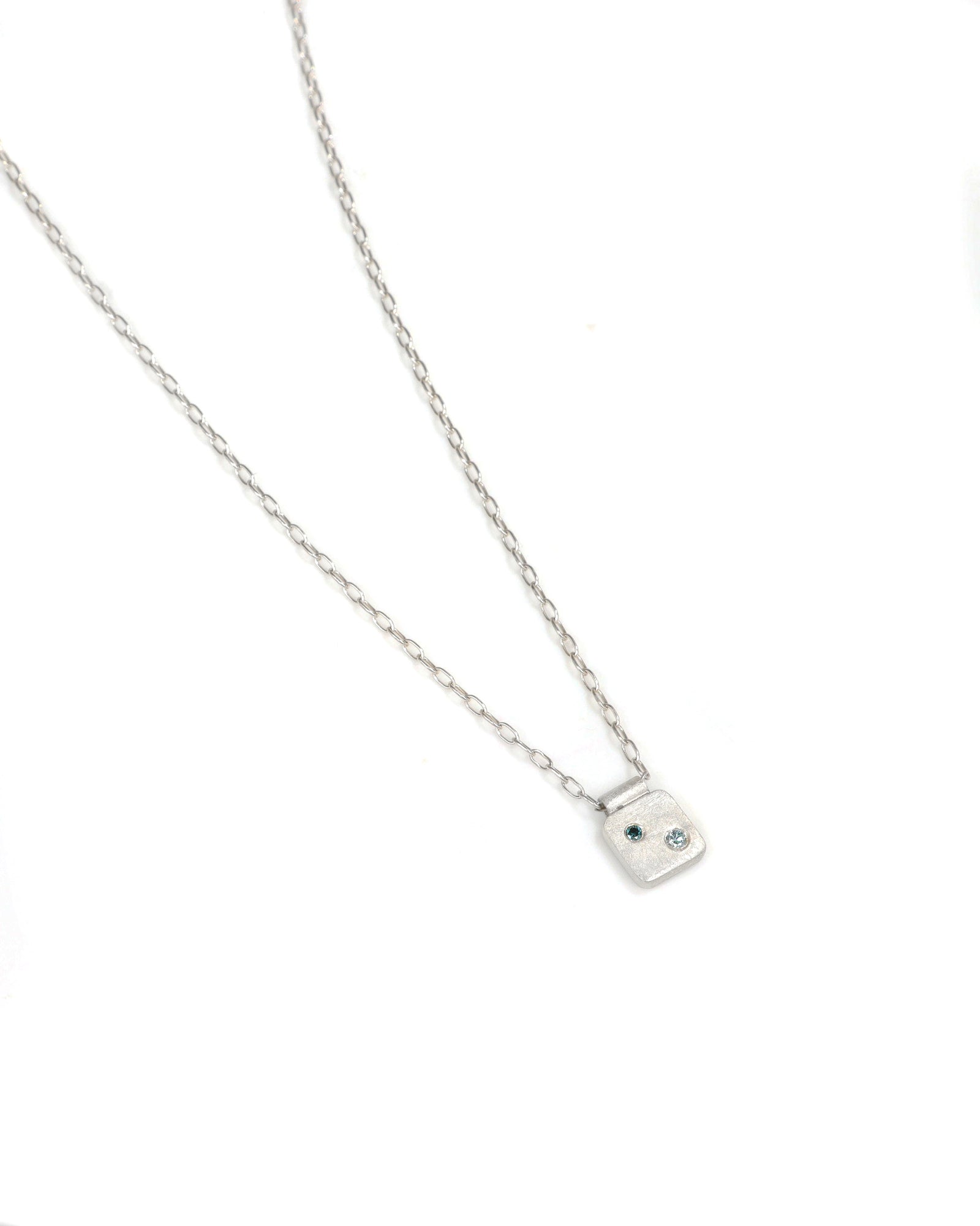 Silver Cell and Blue Diamonds Necklace