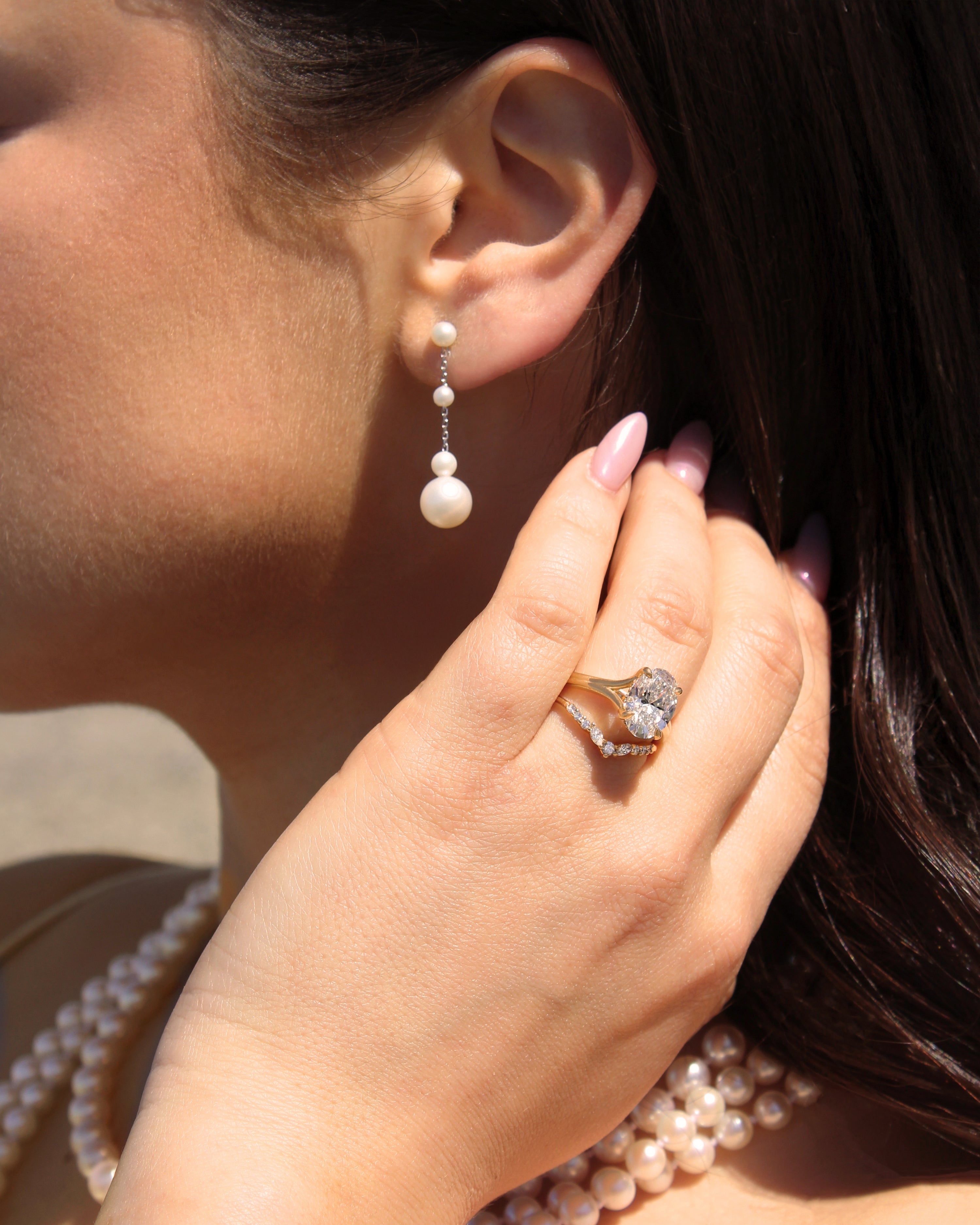 Long Dangle Graduated Pearl Earrings