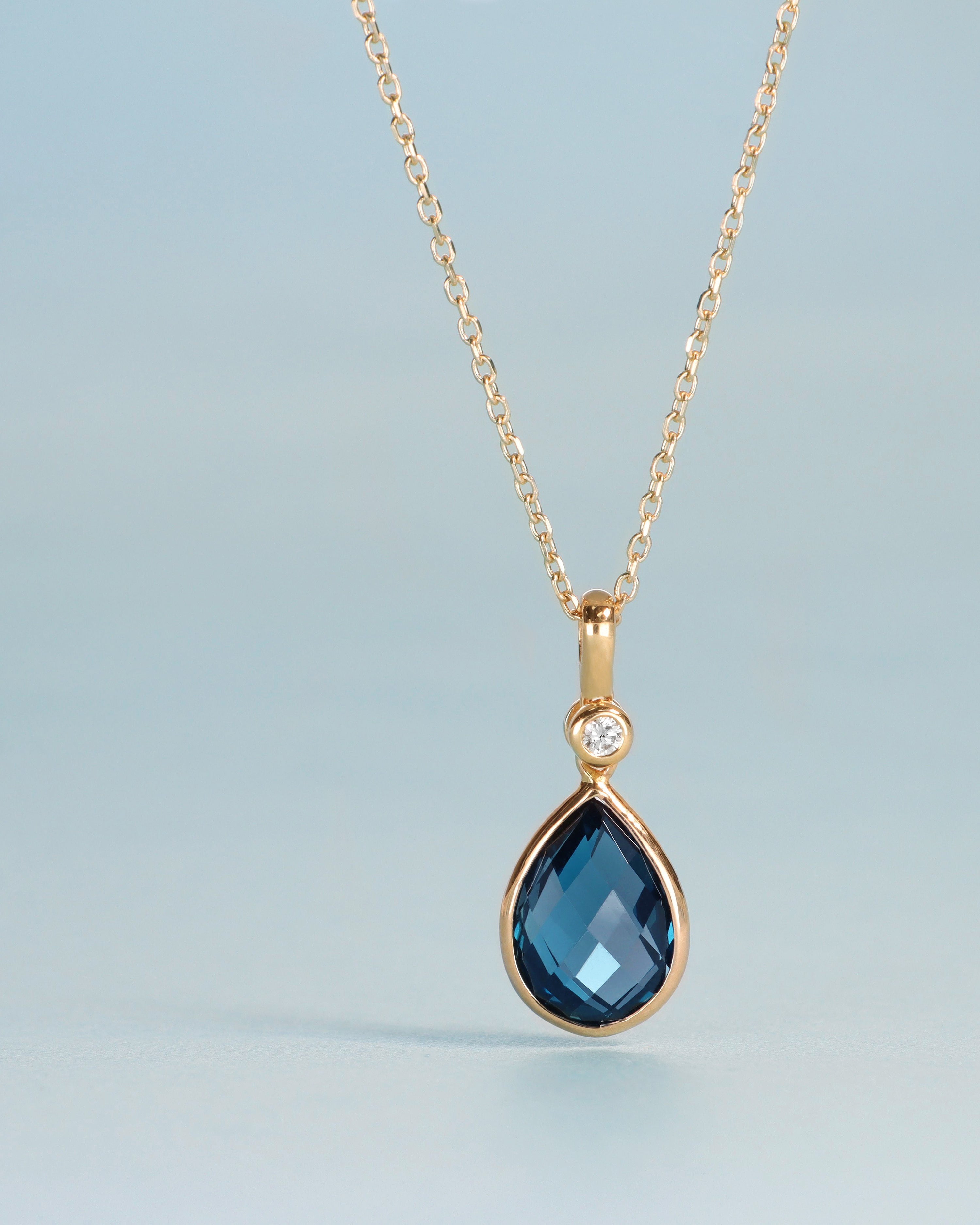 Diamond and Topaz Pendant